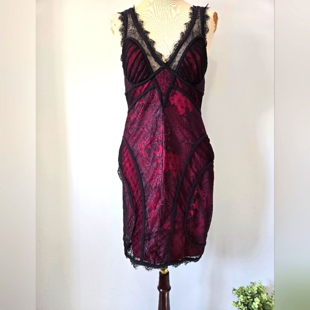 BEBE Bodice Style Black Lace Trimmed Dress With Pink Underlay. Size Medium